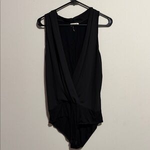 Women’s sleeveless black blousy bodysuit